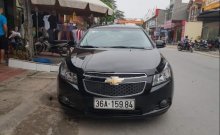 Chính chủ bán xe Cruze LS 2015 màu đen giá 350 triệu tại Thanh Hóa
