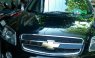 Cần bán xe Chevrolet Captiva LT đăng ký 2010, màu đen, xe gia đình, giá tốt 347tr
