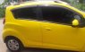 Bán xe Chevrolet Spark sản xuất 2015, màu vàng, nhập khẩu
