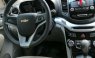 Cần bán Chevrolet Orlando LTZ 1.8 AT sản xuất 2012, màu bạc