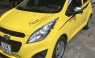 Bán Chevrolet Spark đời 2015, màu vàng, xe nhập
