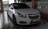 Cần bán Chevrolet Cruze 2011, màu trắng xe gia đình