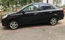 Bán Chevrolet Aveo LT 1.4 MT 2017, màu đen, số sàn, 295 triệu